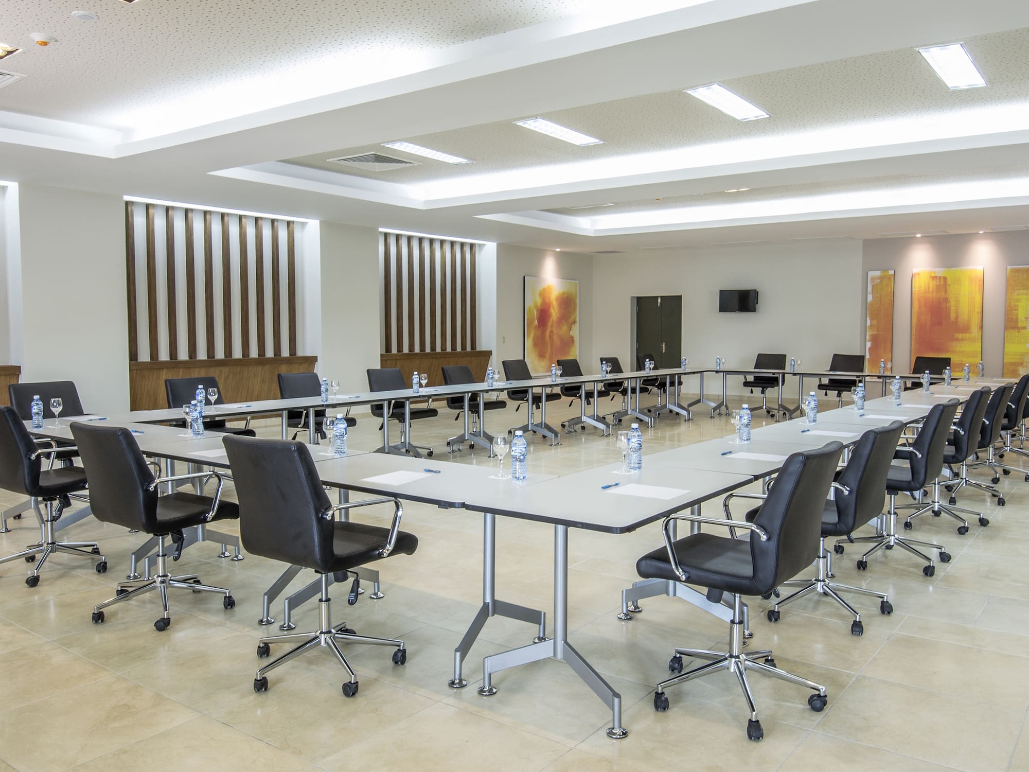 a conference room with chairs and tables