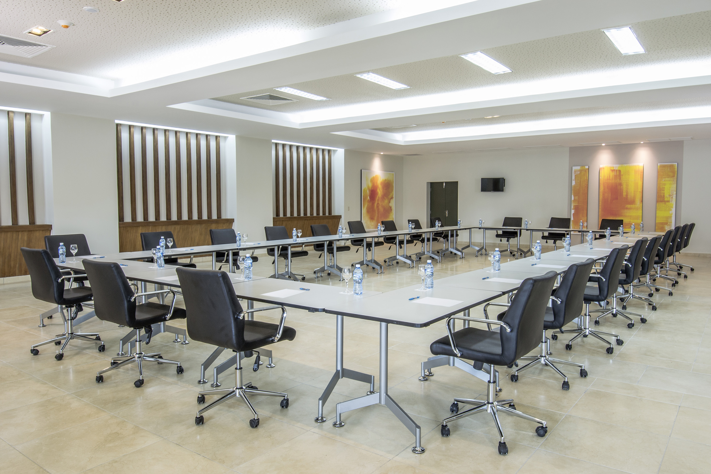 a conference room with chairs and tables