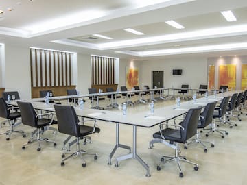 a conference room with chairs and tables