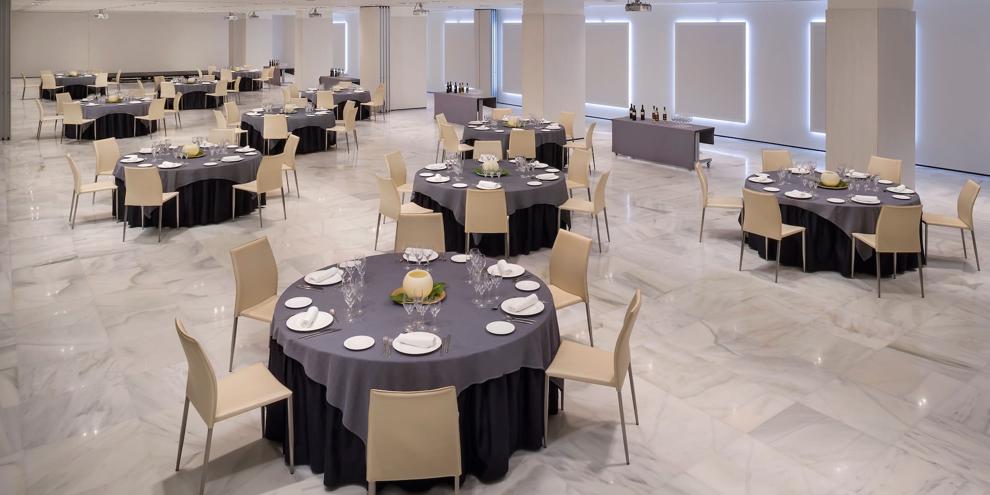 a large room with tables and chairs