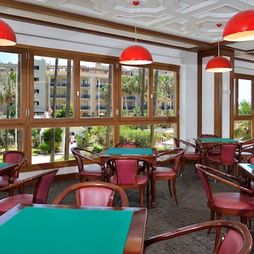 a room with tables and chairs