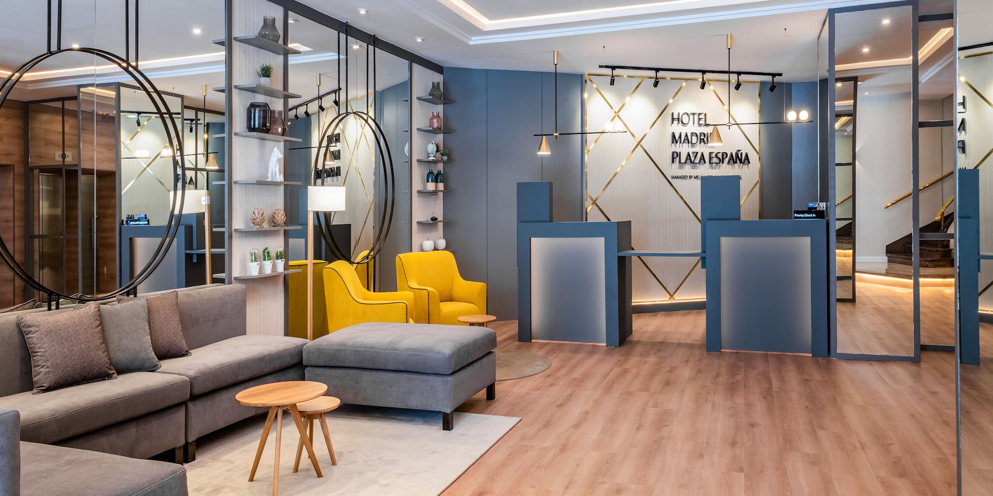 a lobby with a reception desk and a couch