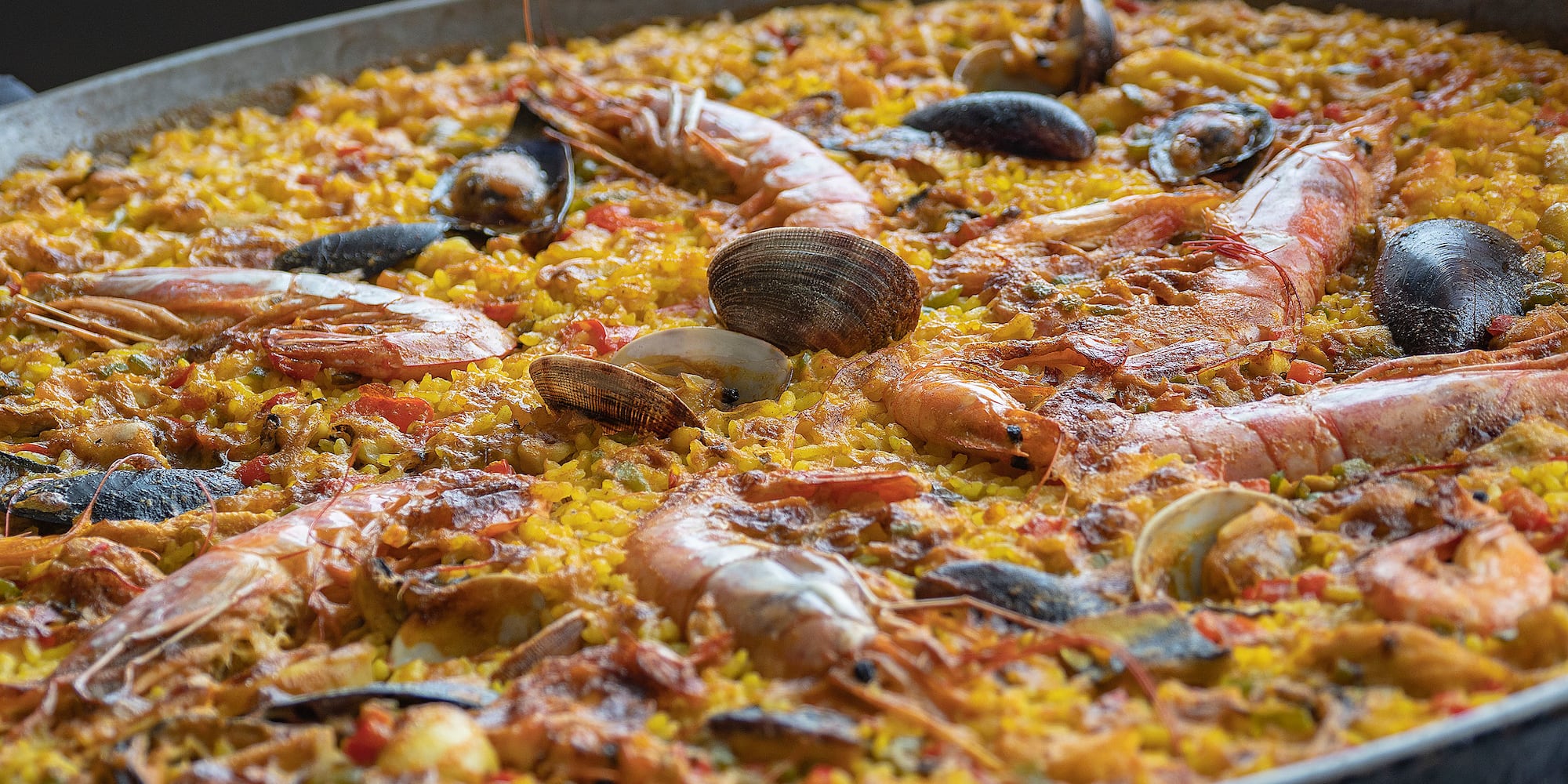 a large pan of seafood paella