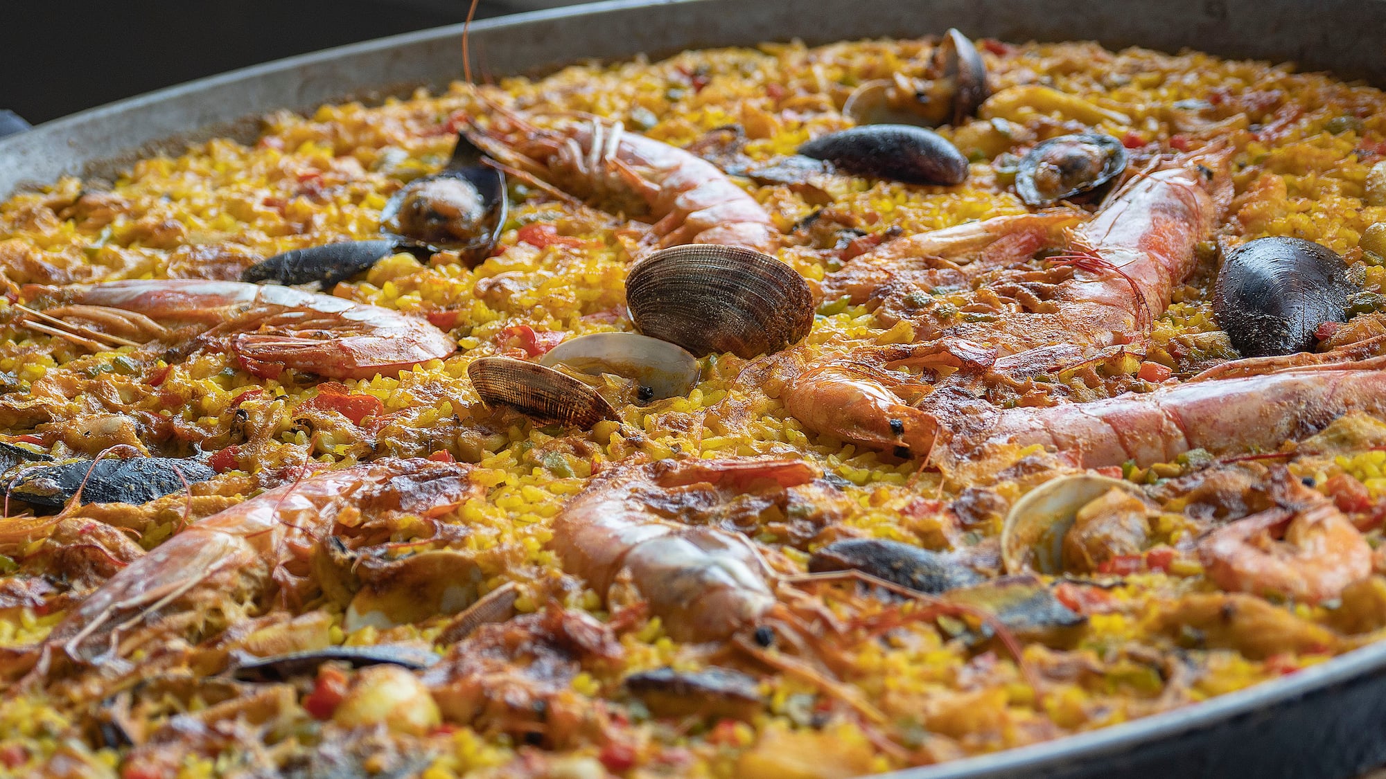 a large pan of seafood paella