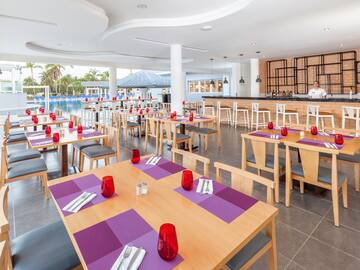 a restaurant with tables and chairs