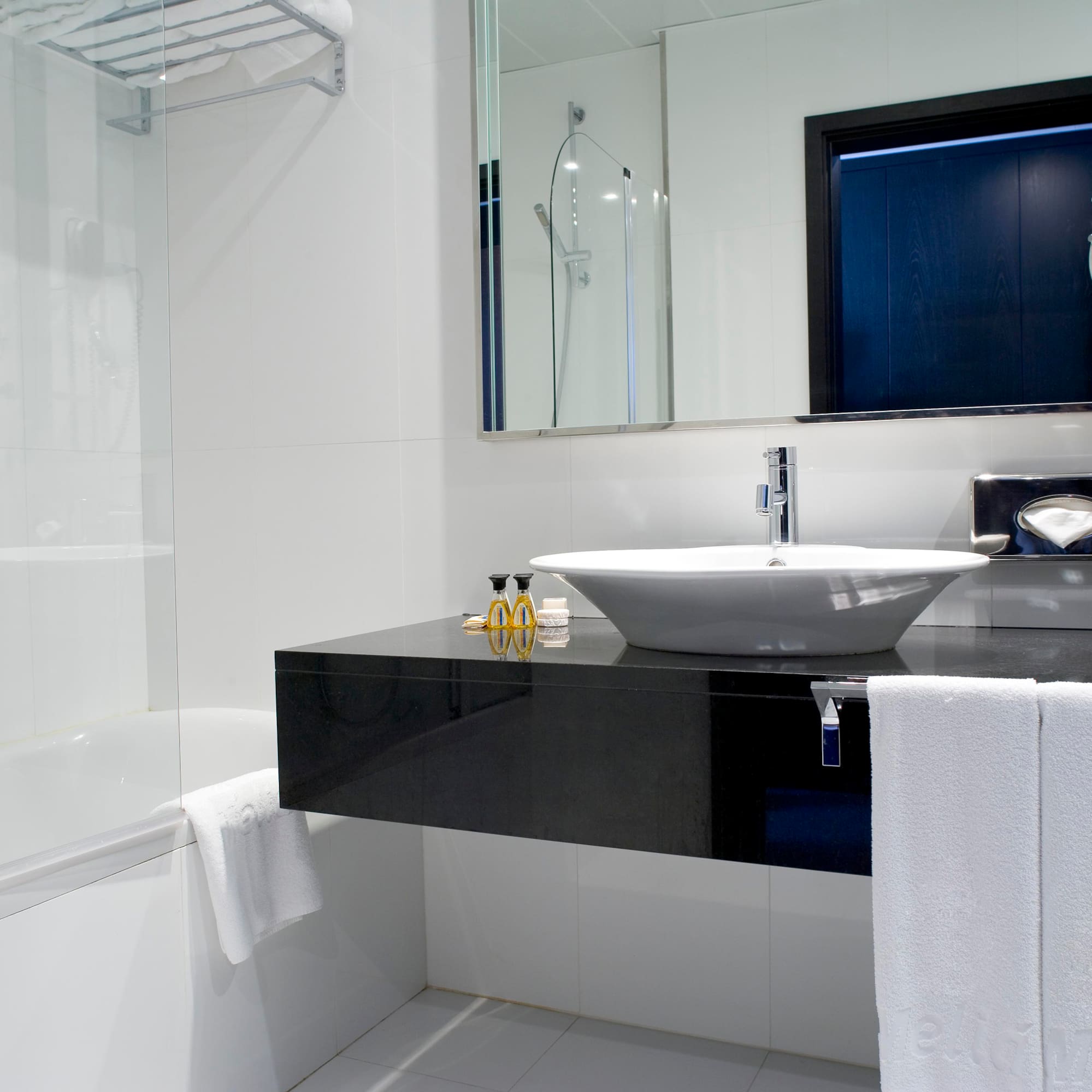 a bathroom with a sink and bathtub