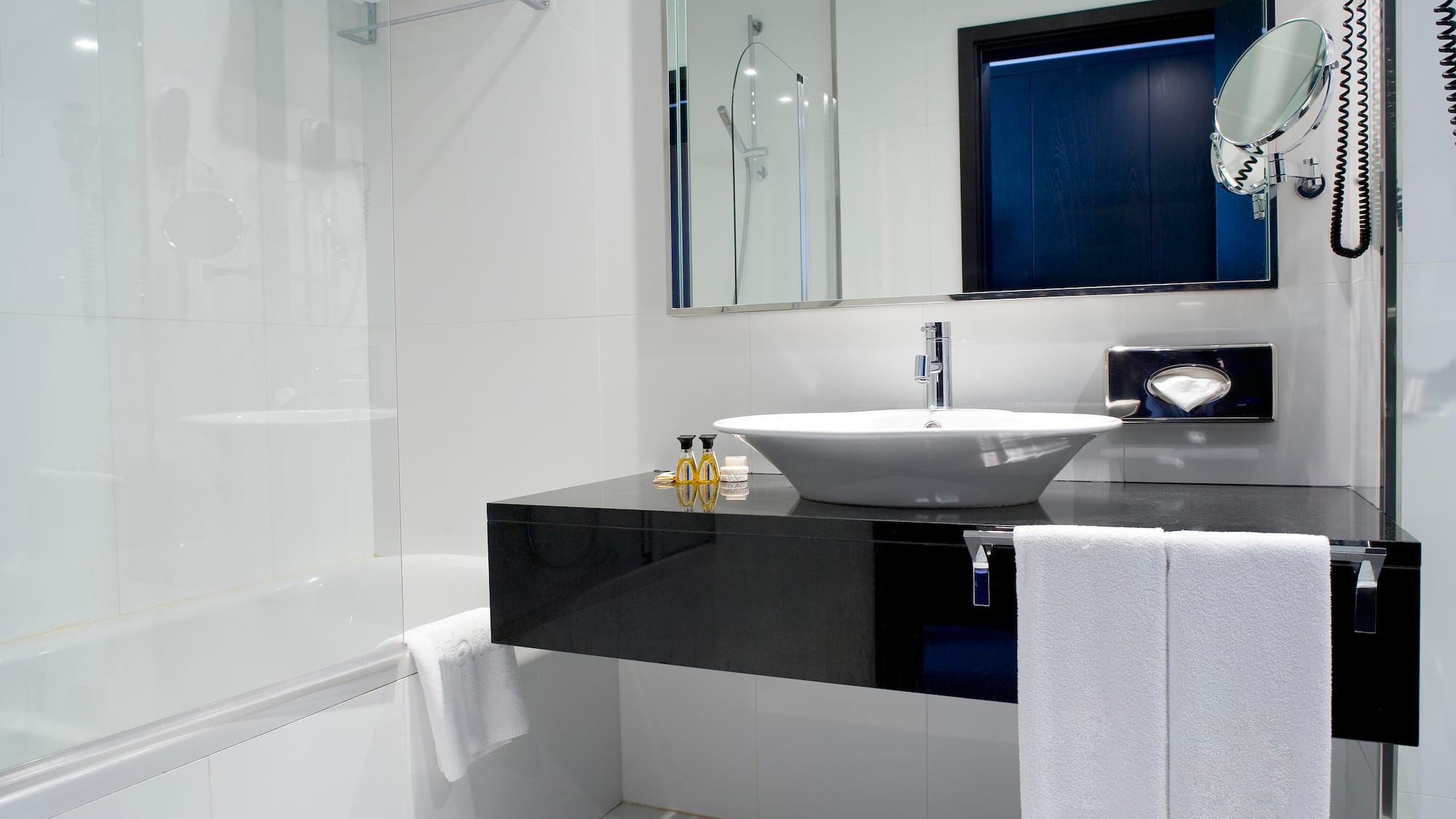a bathroom with a sink and bathtub
