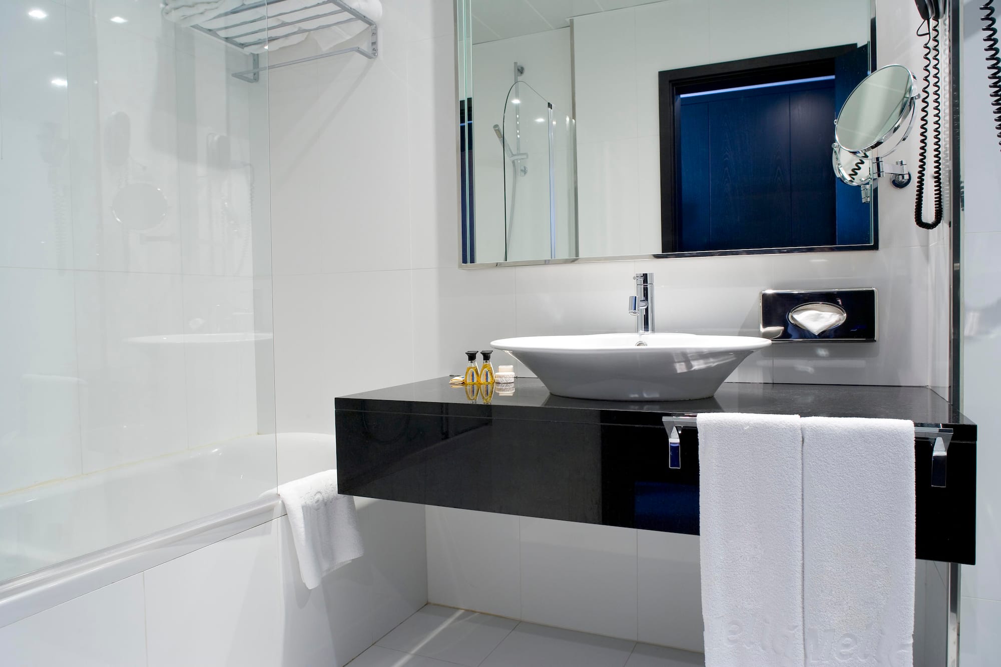 a bathroom with a sink and bathtub