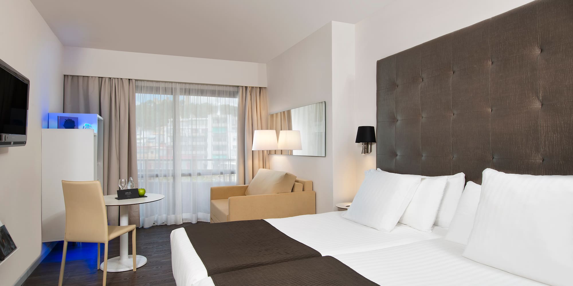 a room with a bed and a table