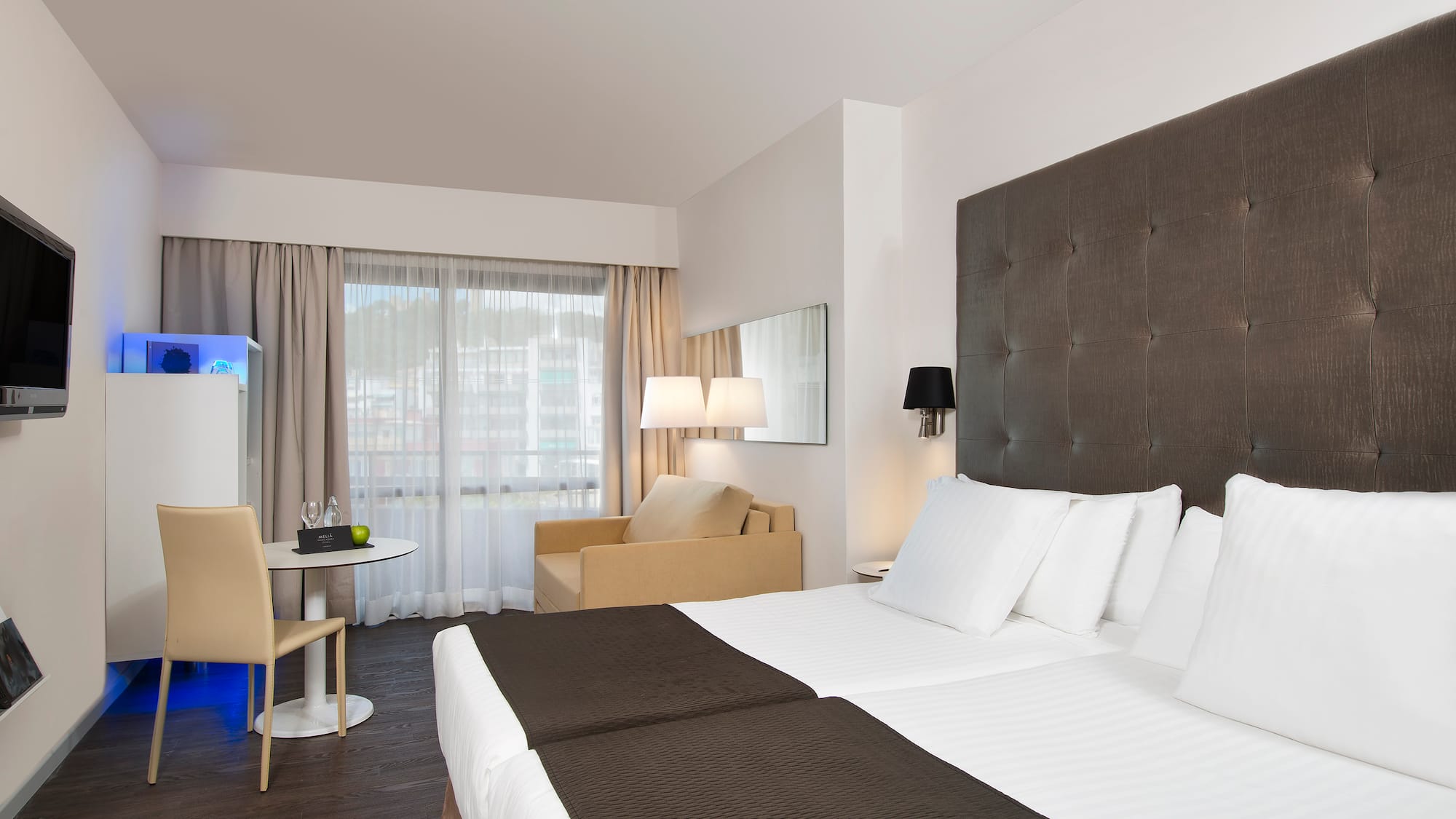 a room with a bed and a table