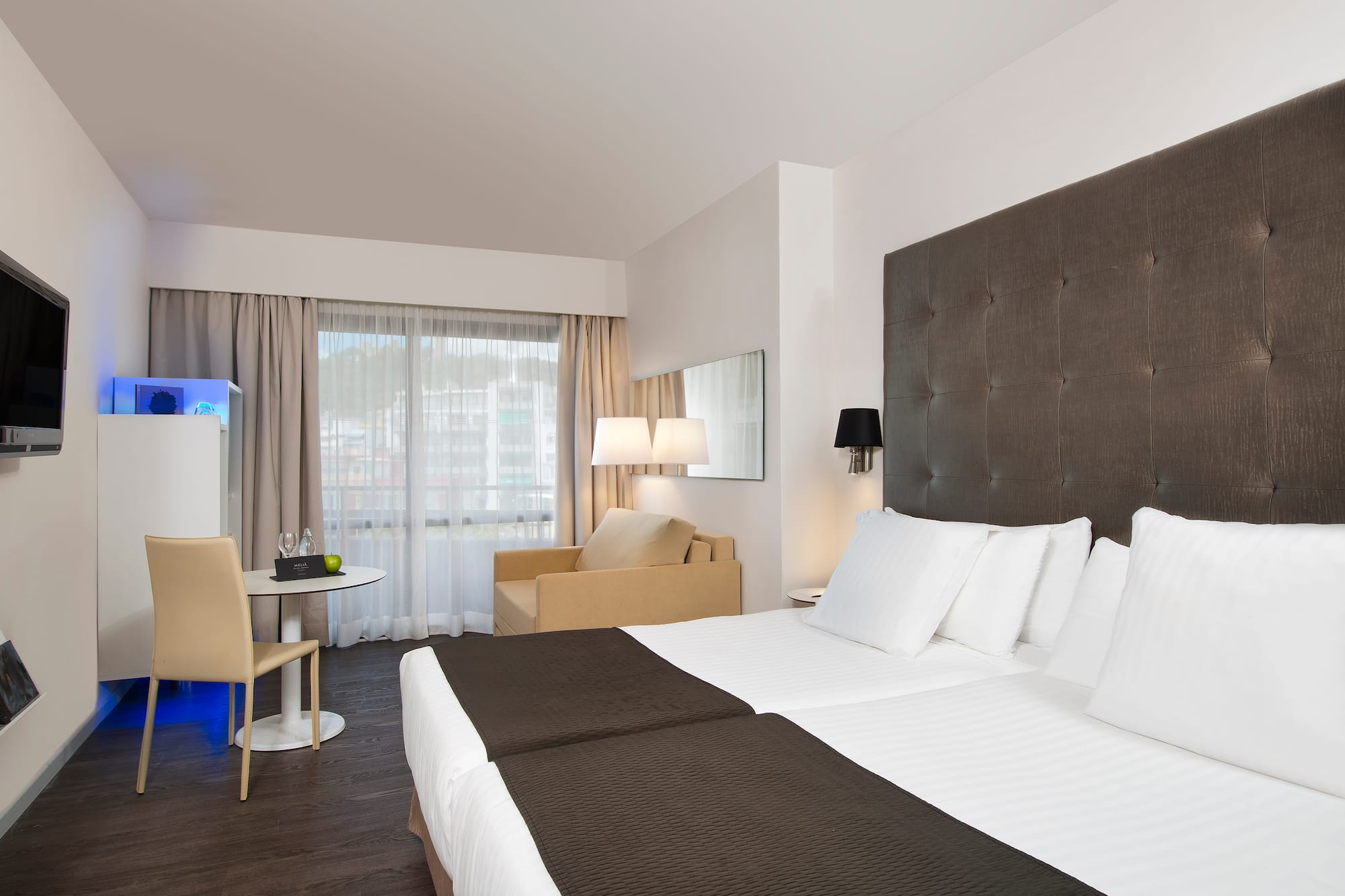 a room with a bed and a table