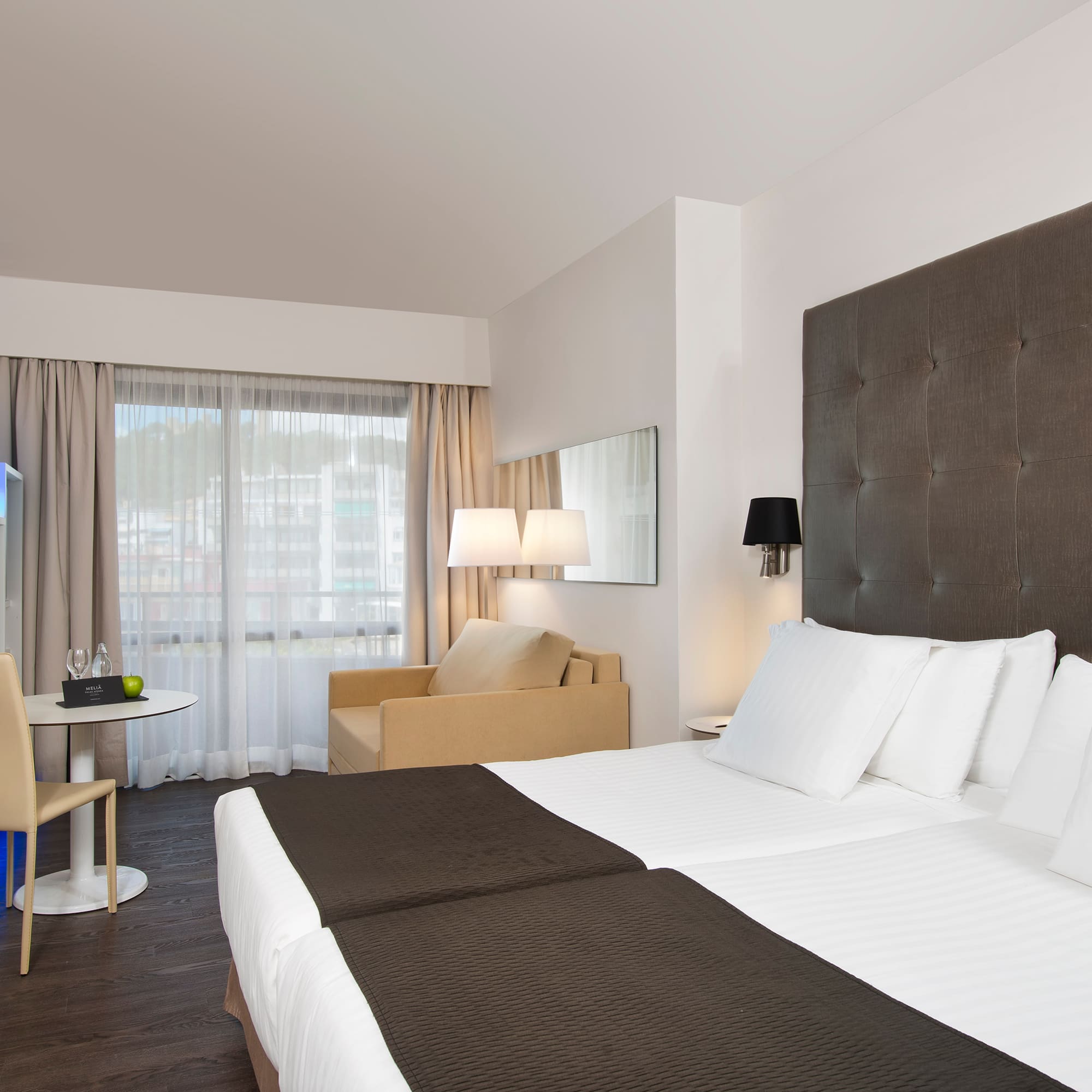 a room with a bed and a table