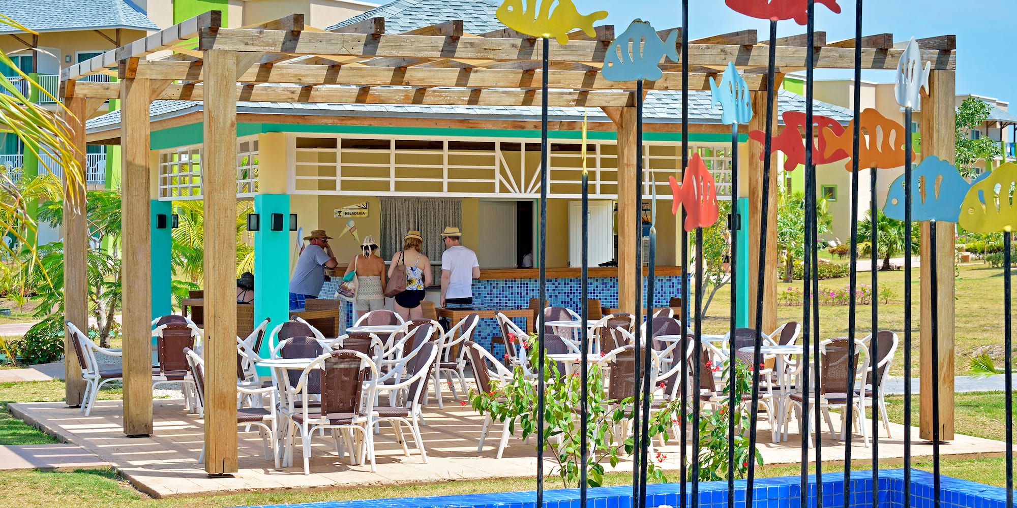 a group of people standing in a restaurant