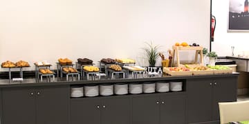 a buffet with food on it