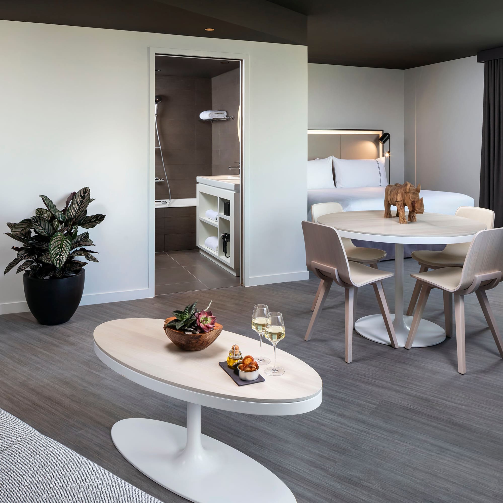 a room with a table and chairs