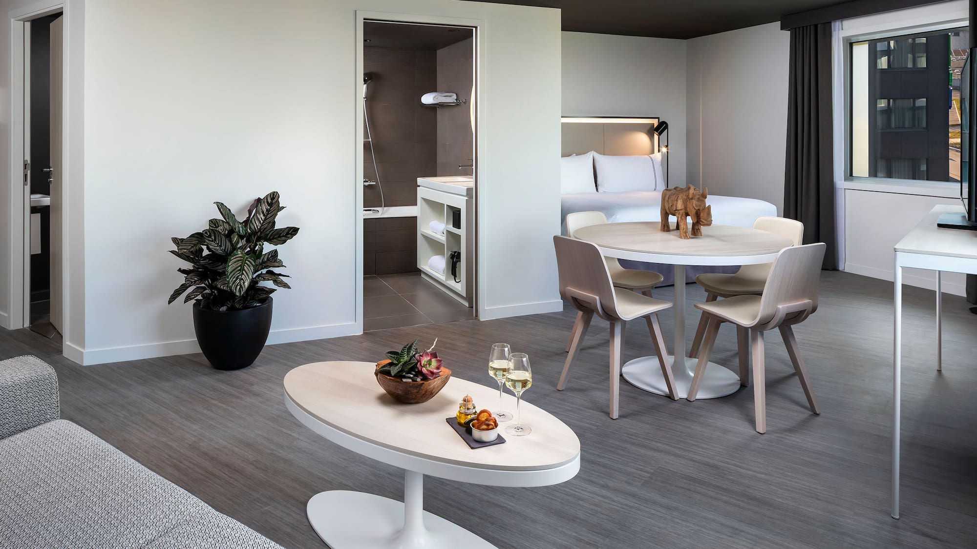 a room with a table and chairs