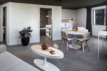 a room with a table and chairs