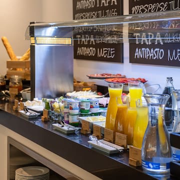 a counter with food and drinks