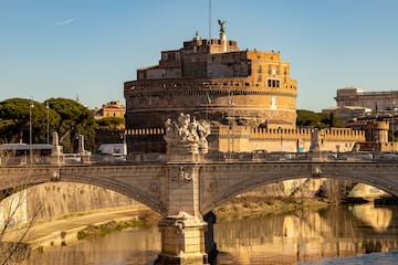 Castel Sant'Angelo over water with a castle on top