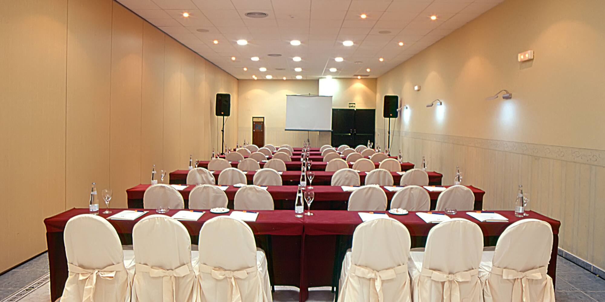 a room with tables and chairs