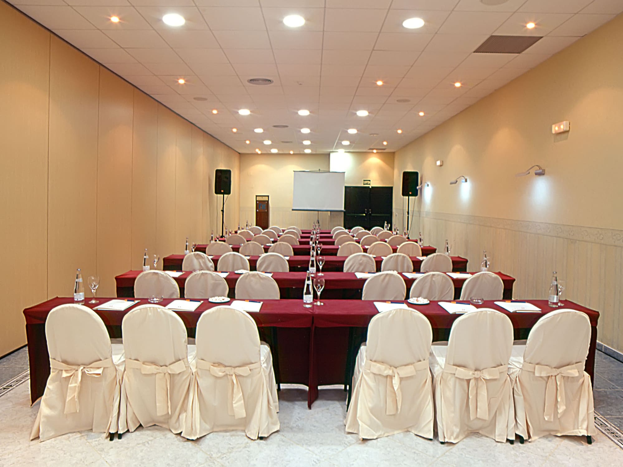 a room with tables and chairs
