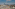 a city with many buildings and a river