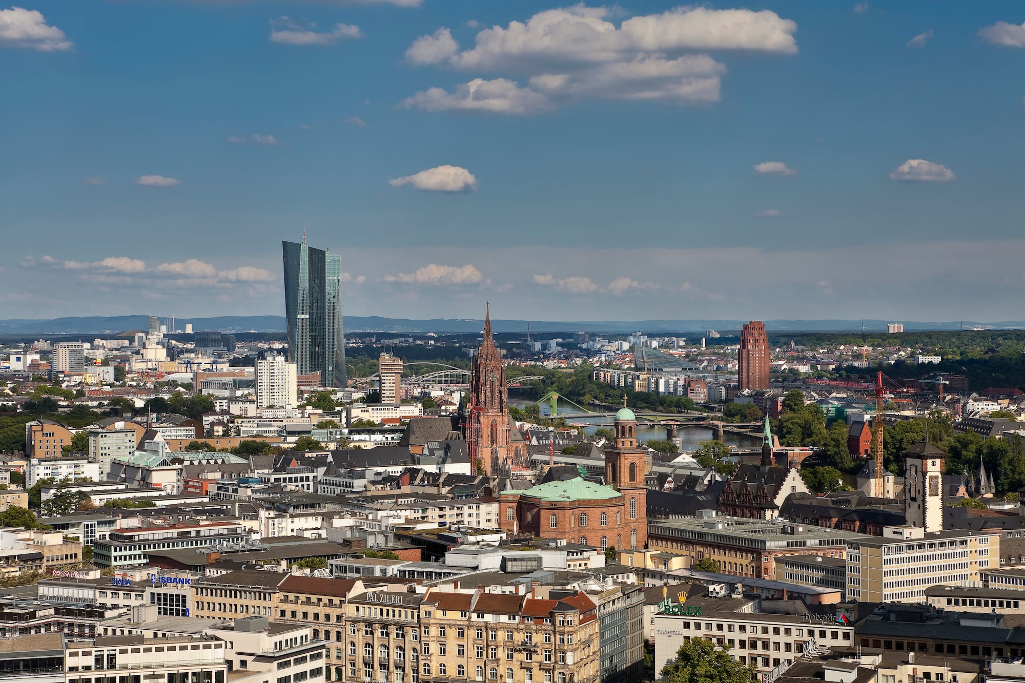 a city with many buildings and a river