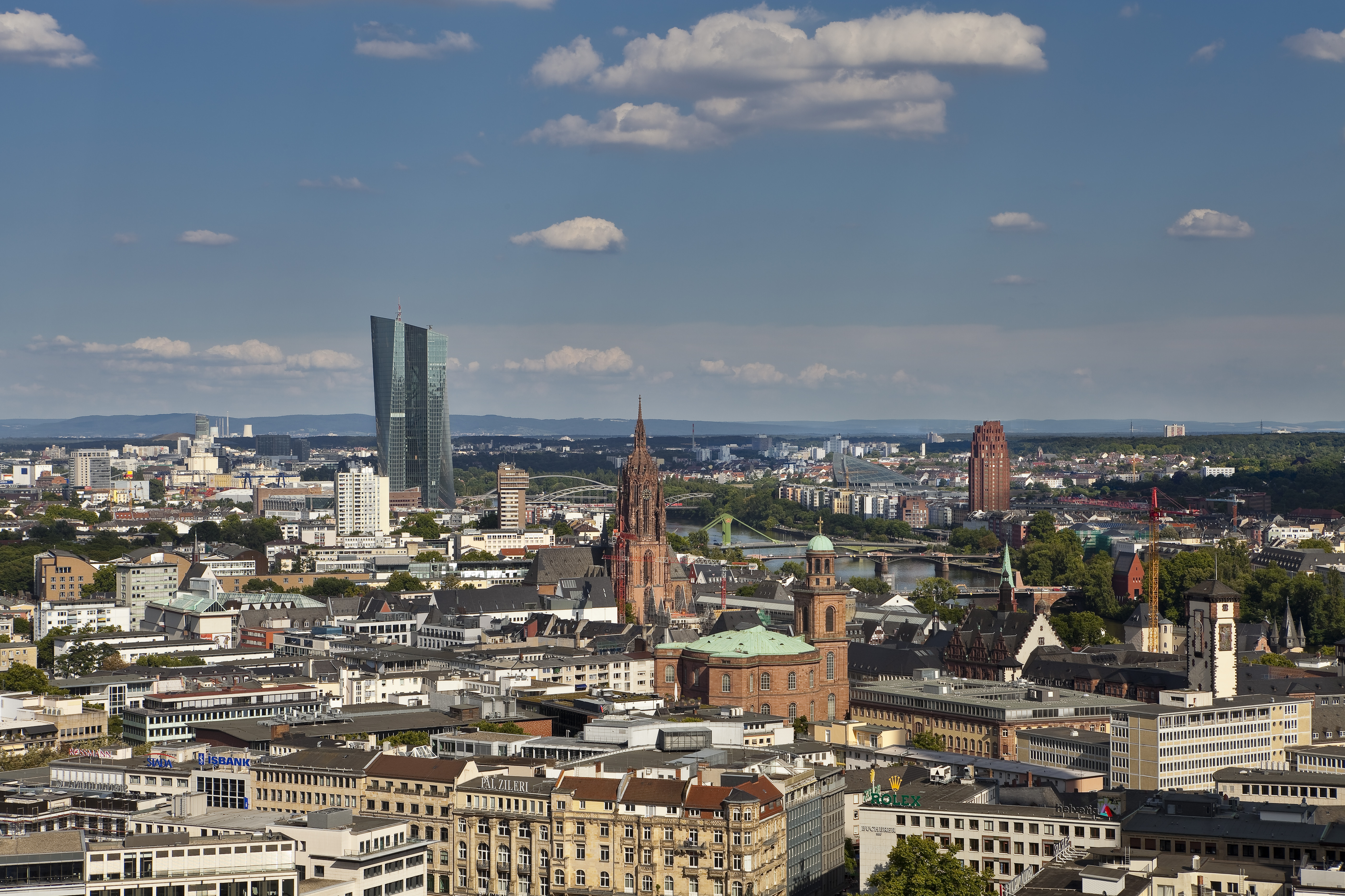 a city with many buildings and a river