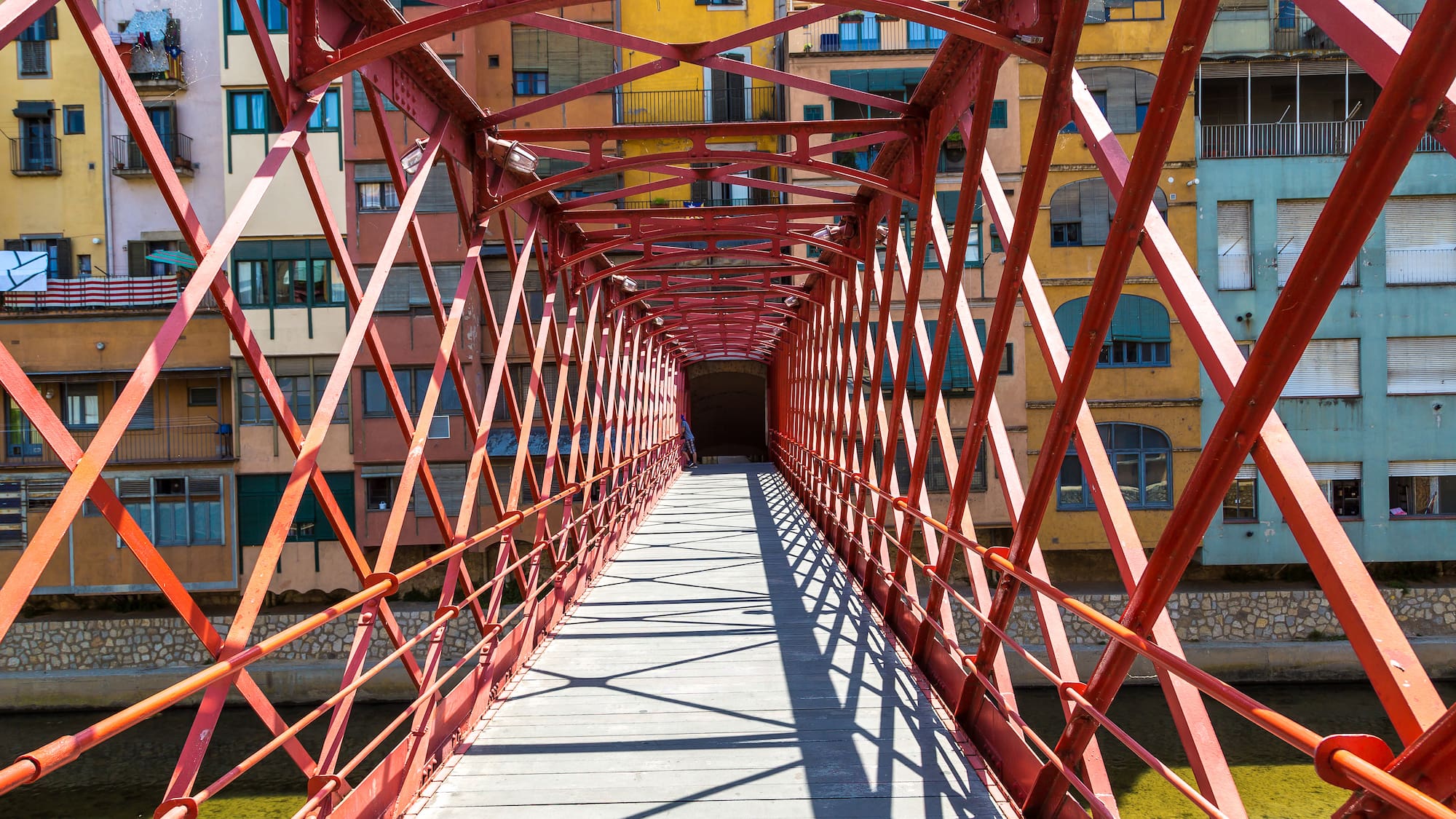 a bridge with red bars