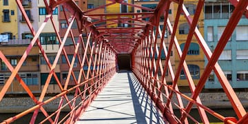 a bridge with red bars