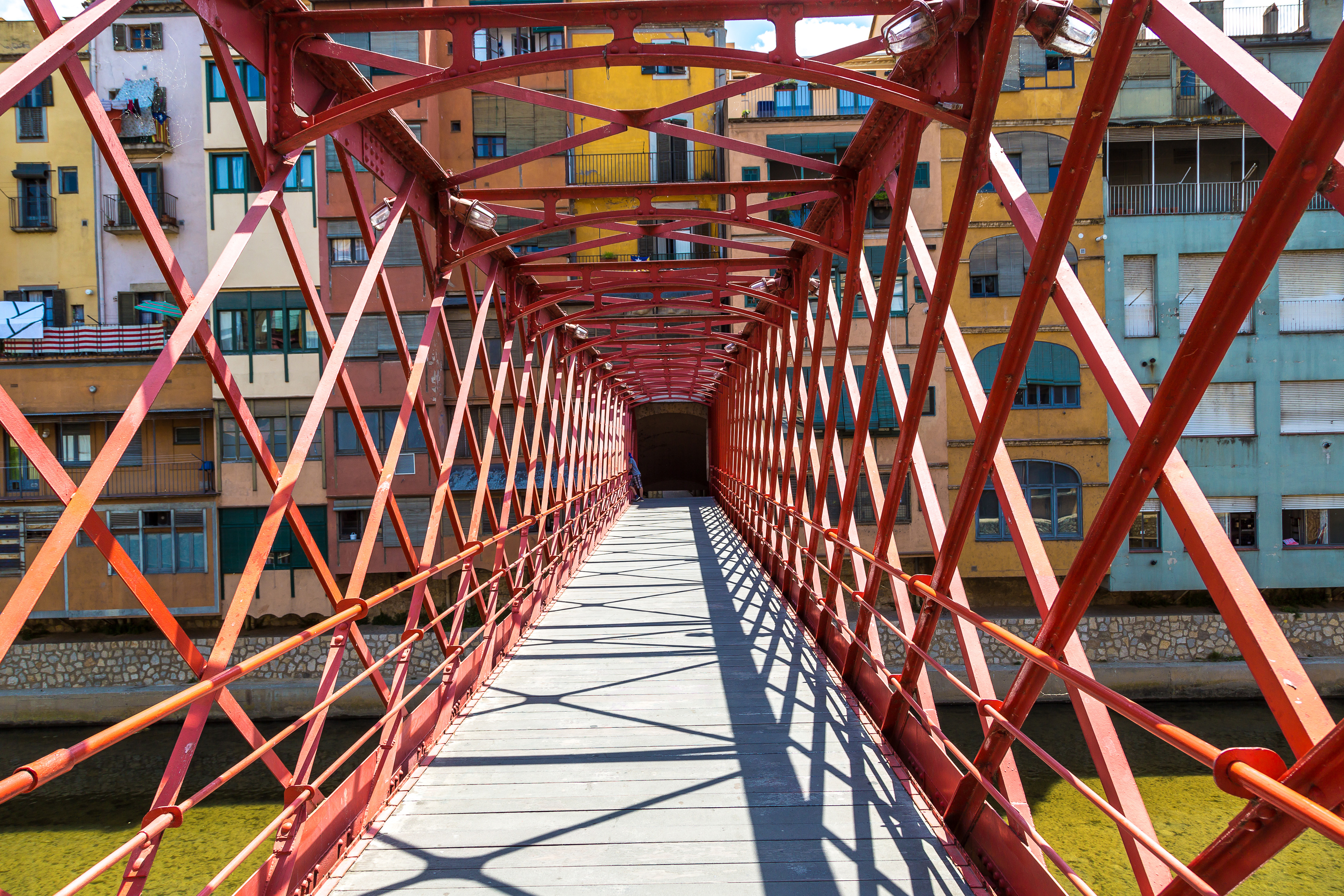 a bridge with red bars