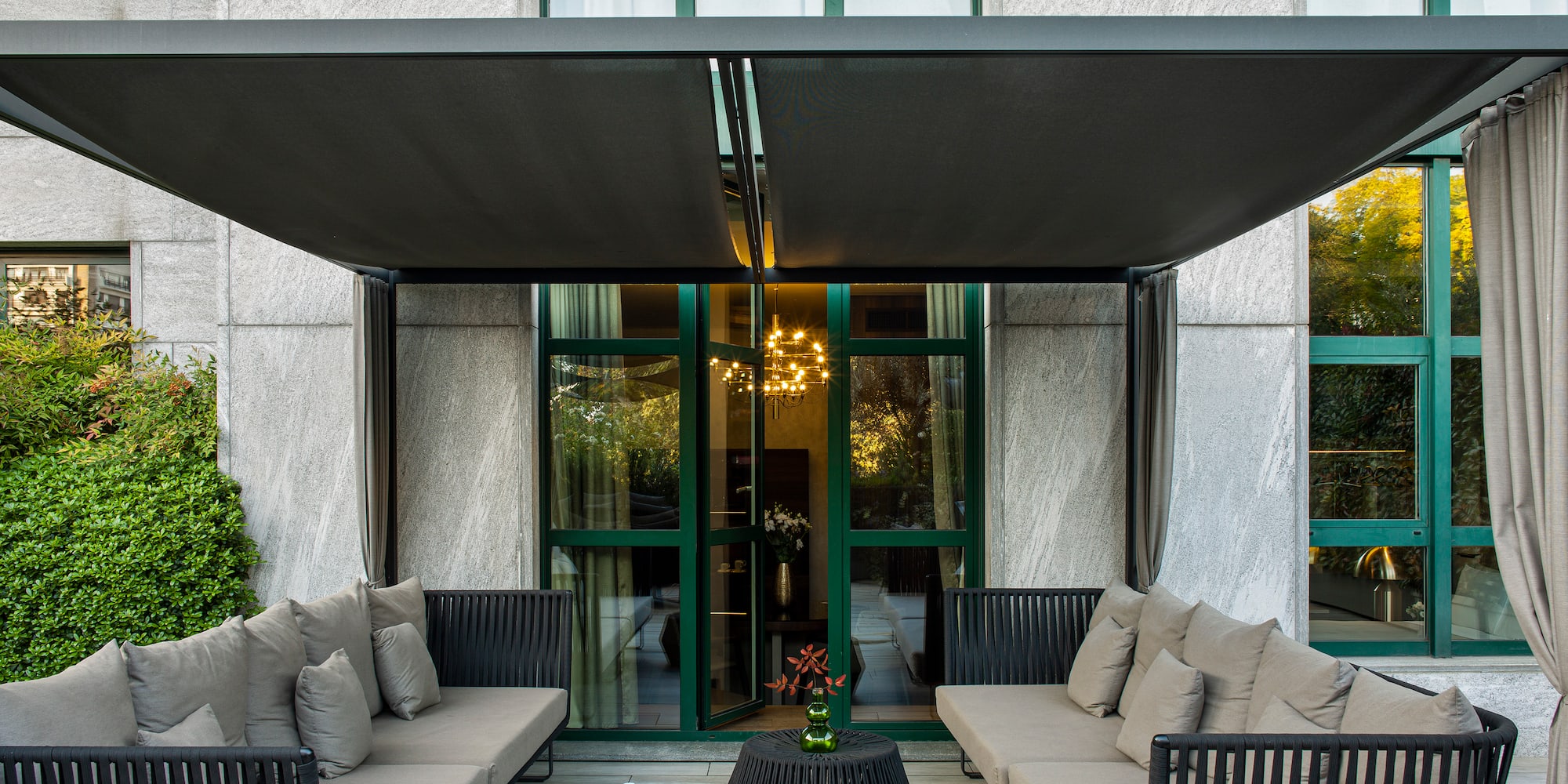 a patio with a couch and a table