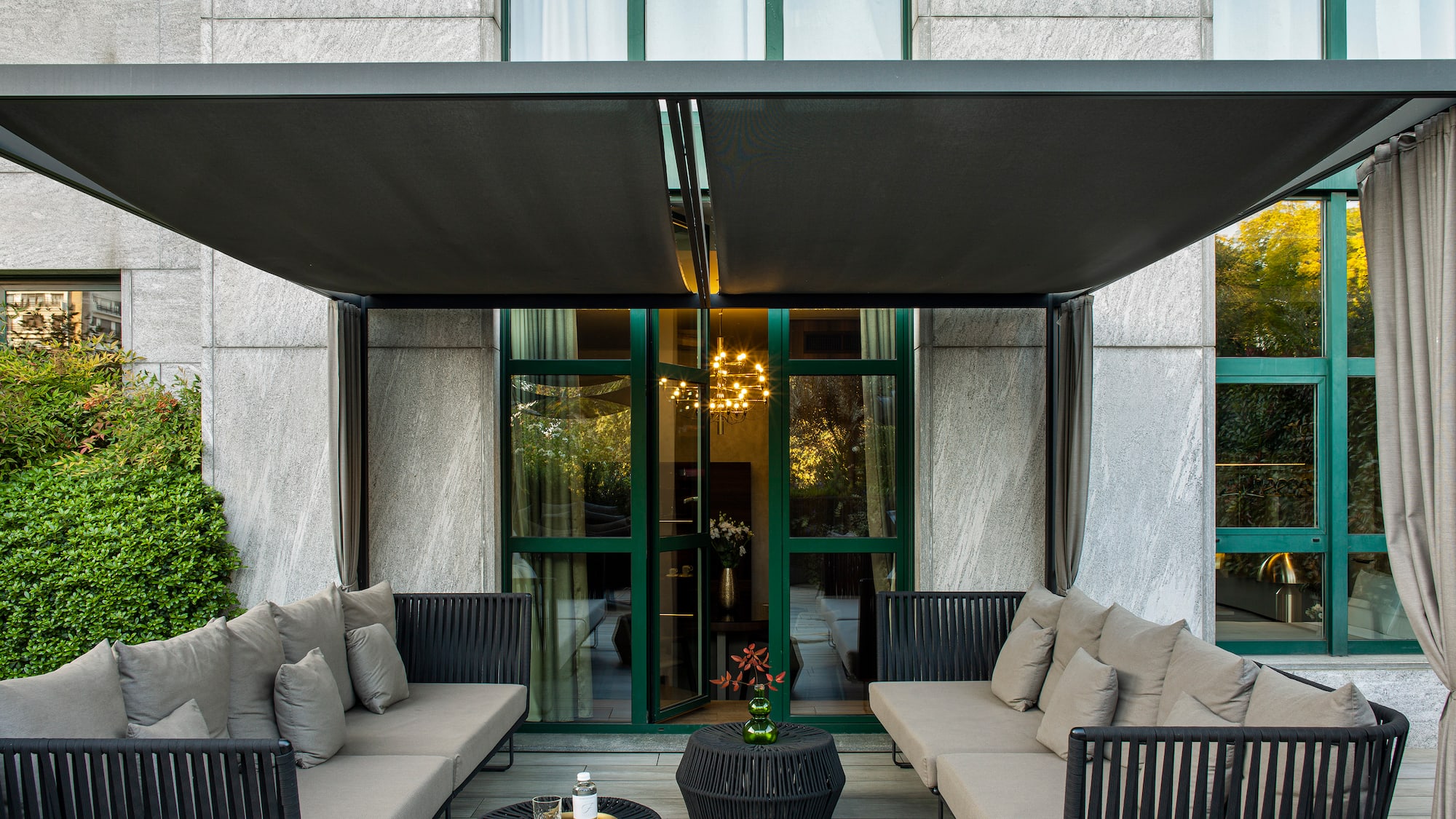 a patio with a couch and a table