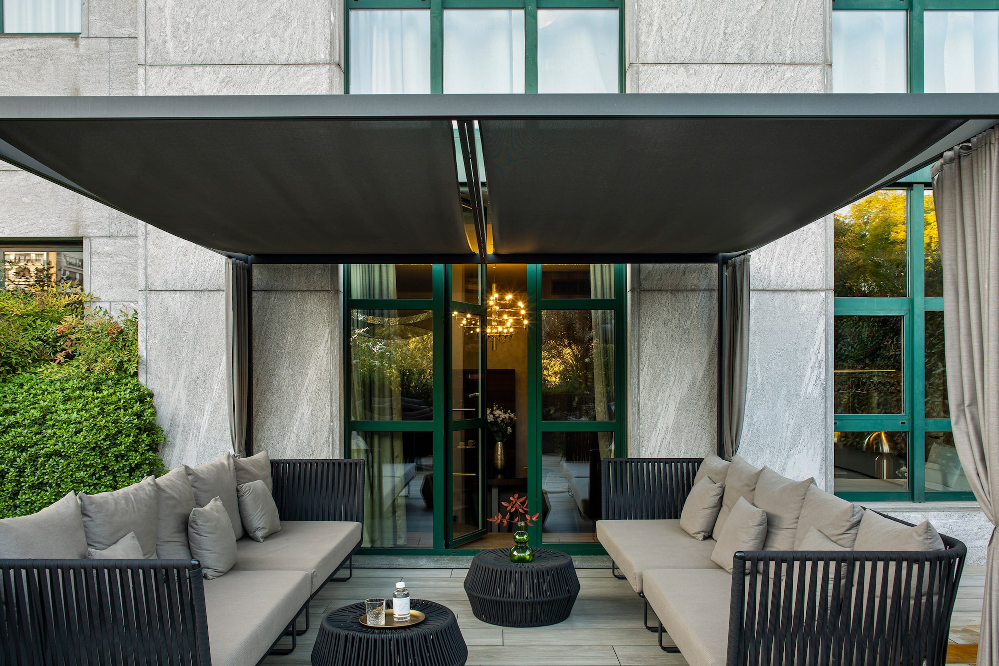 a patio with a couch and a table