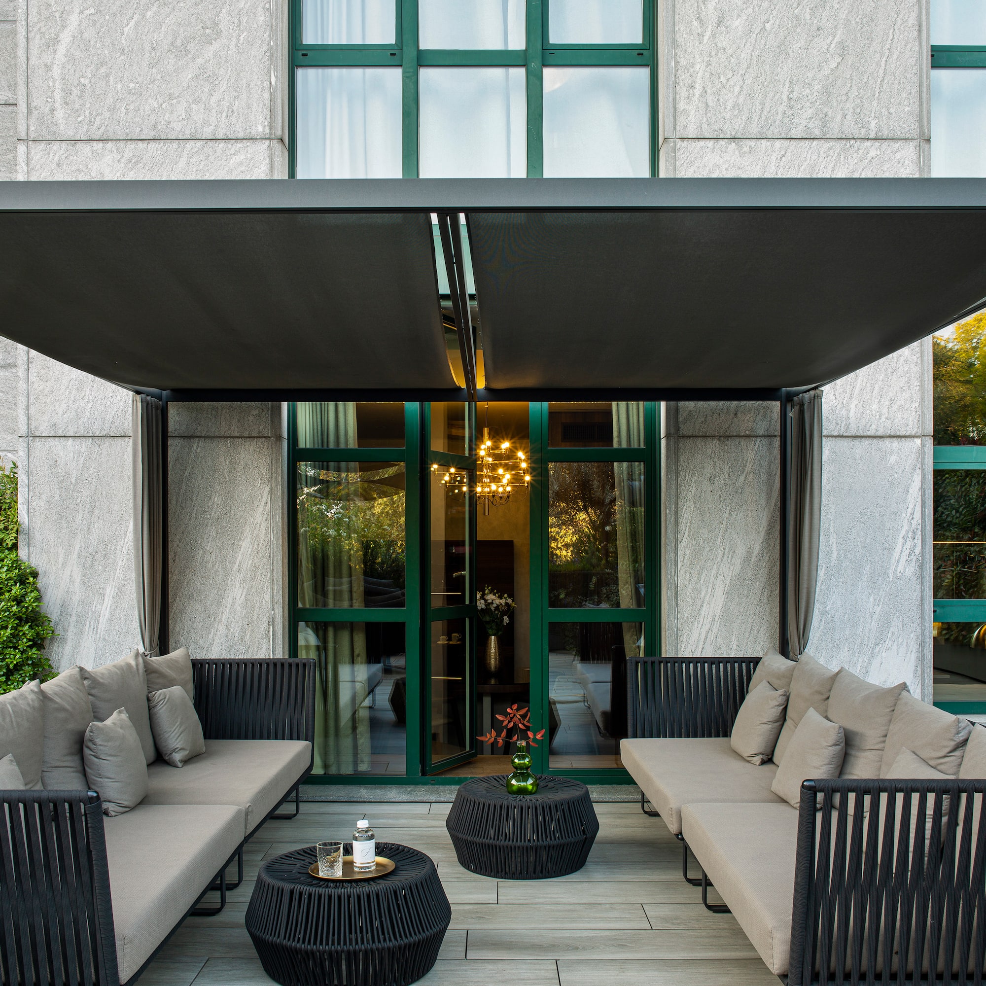 a patio with a couch and a table