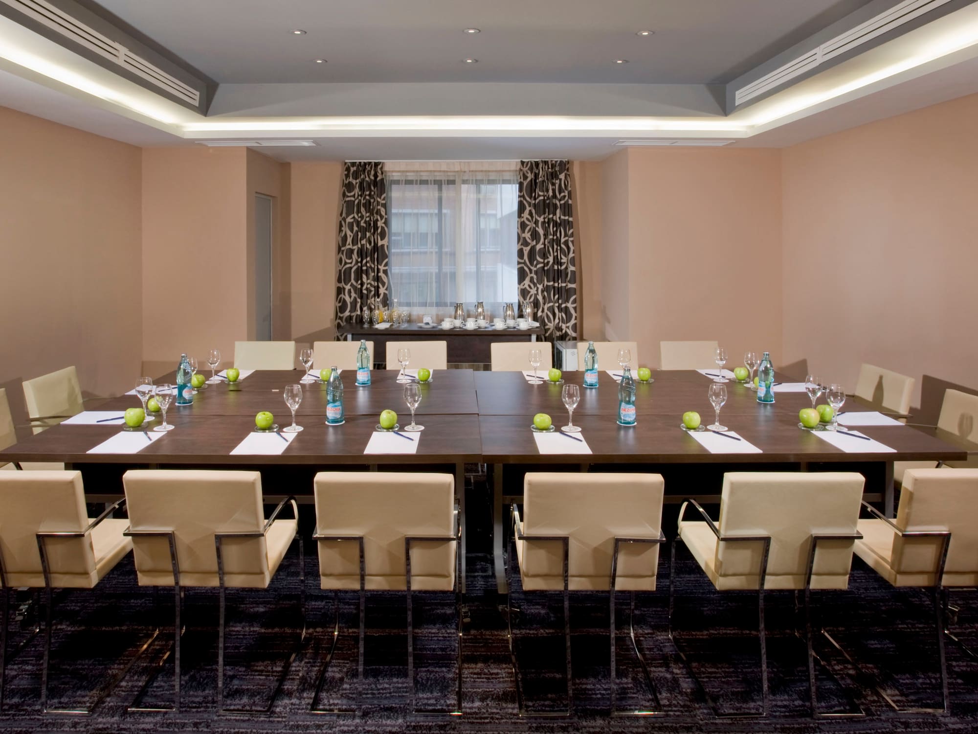 a room with a table and chairs