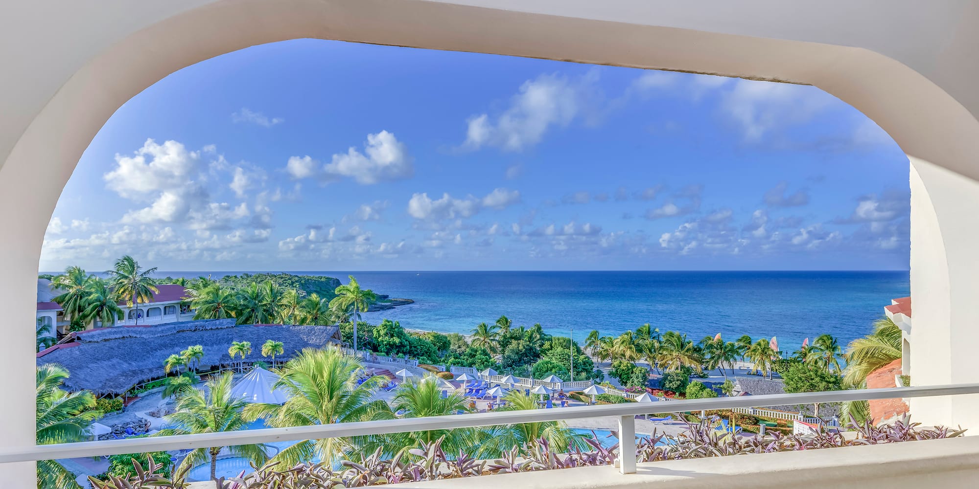 a view of a beach from a window
