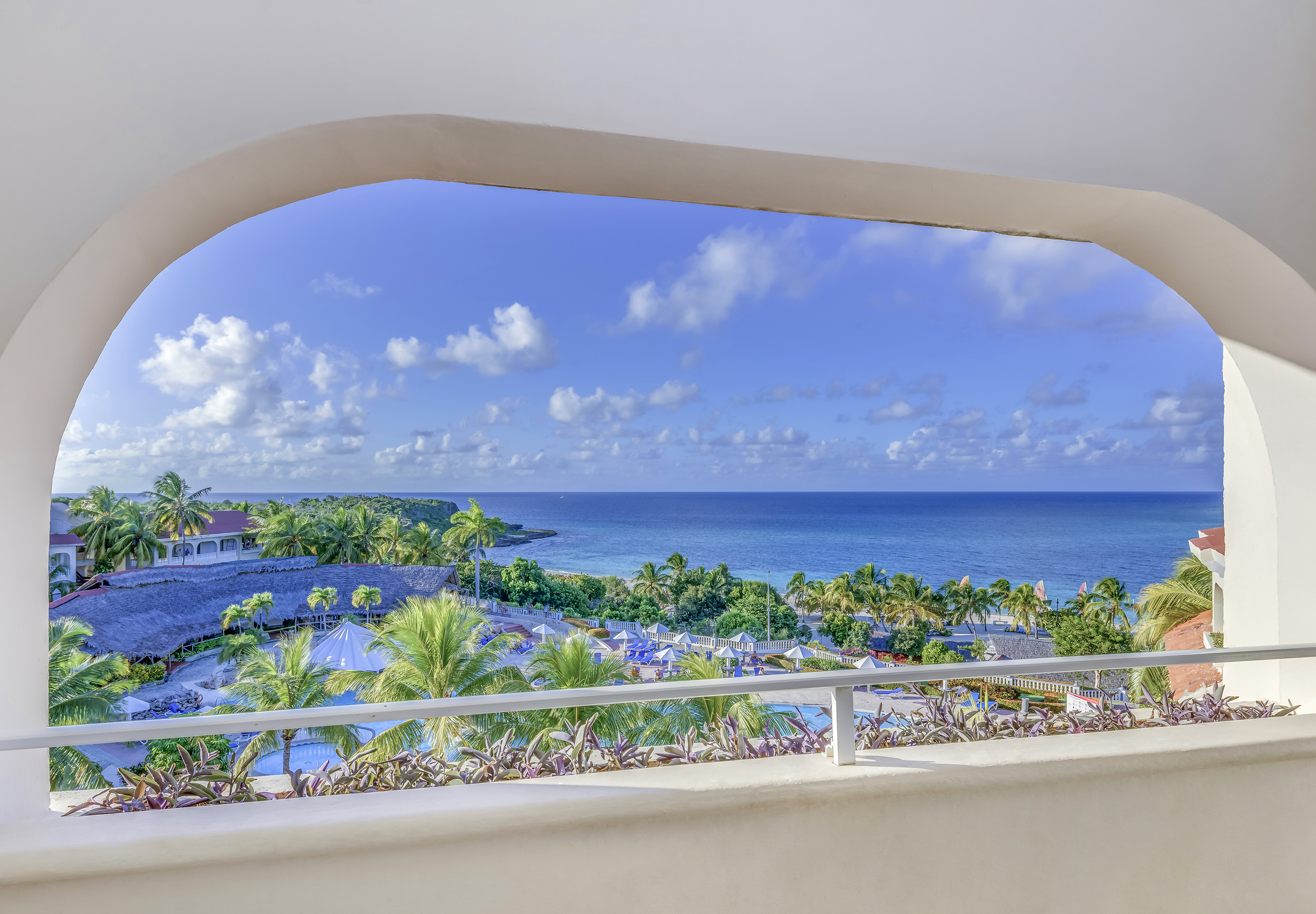 a view of a beach from a window