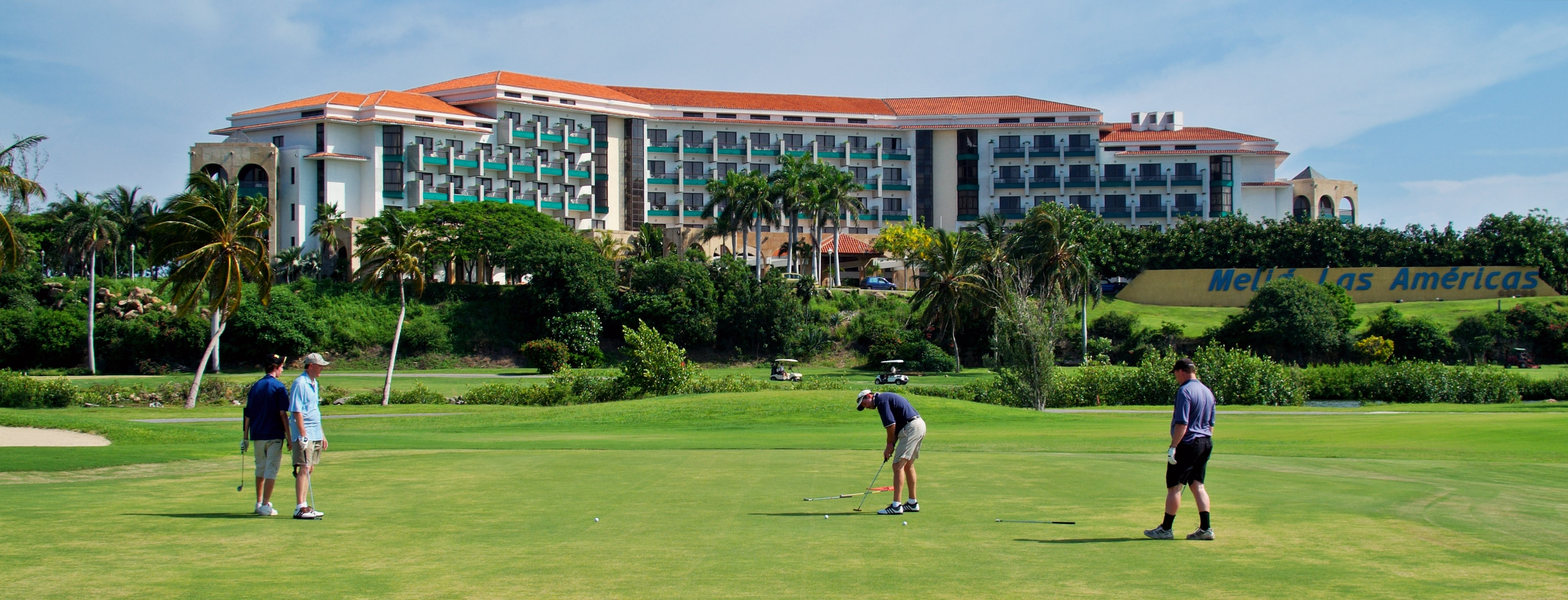 a man playing golf on a golf course