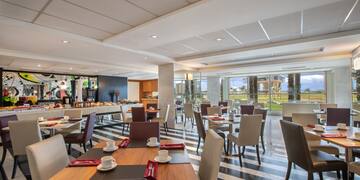 a room with tables and chairs