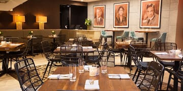 a restaurant with tables and chairs