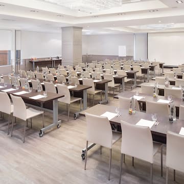 a room with tables and chairs