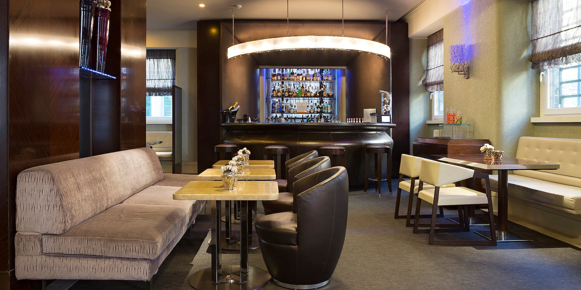 a room with a bar and a couch