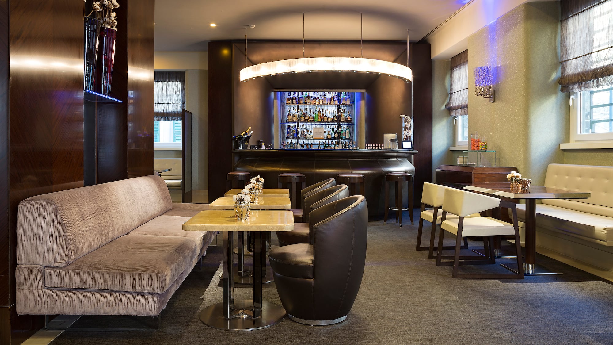 a room with a bar and a couch