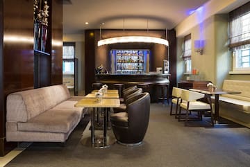 a room with a bar and a couch