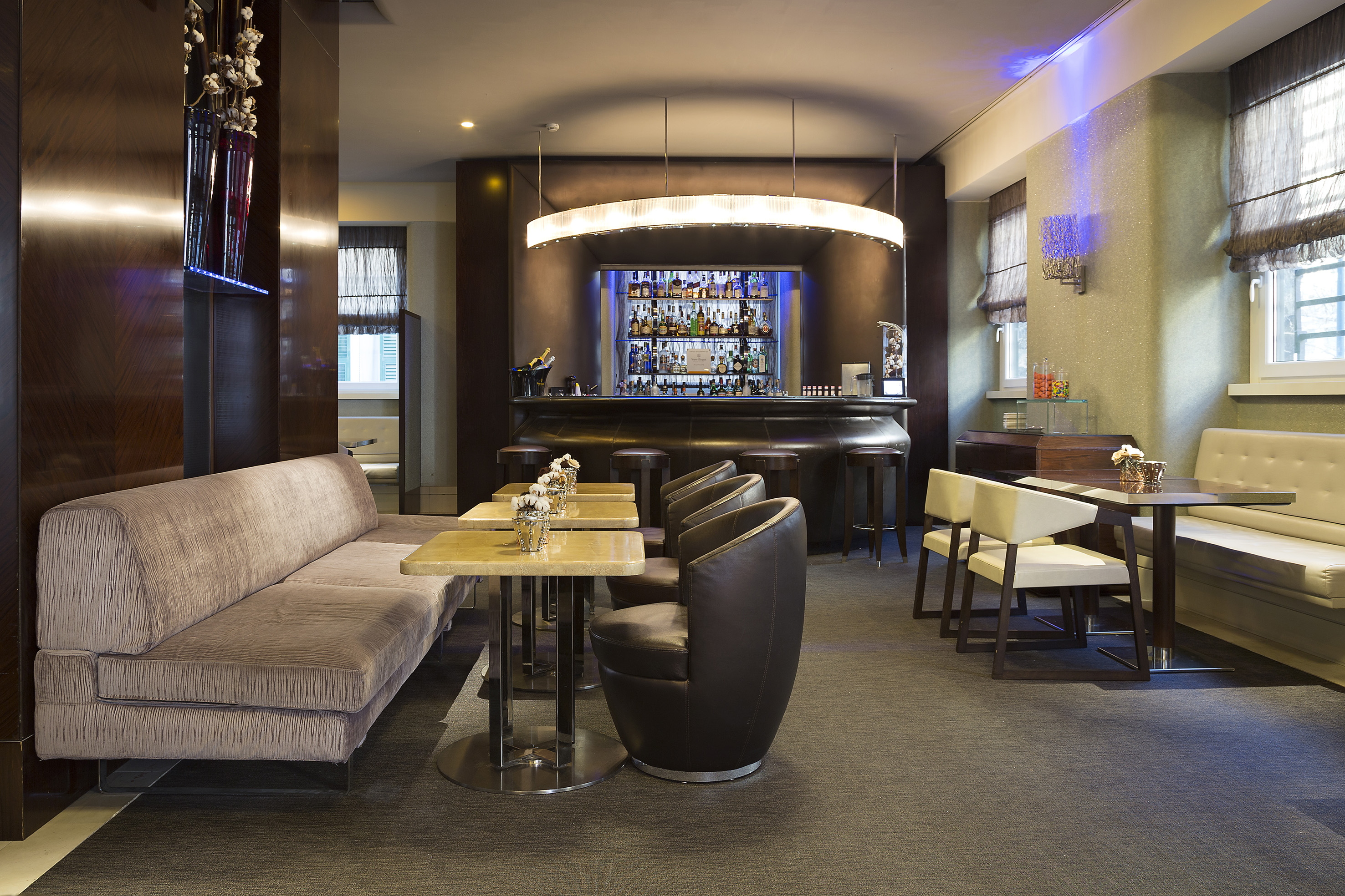 a room with a bar and a couch