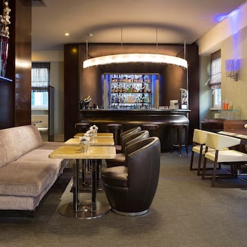 a room with a bar and a couch
