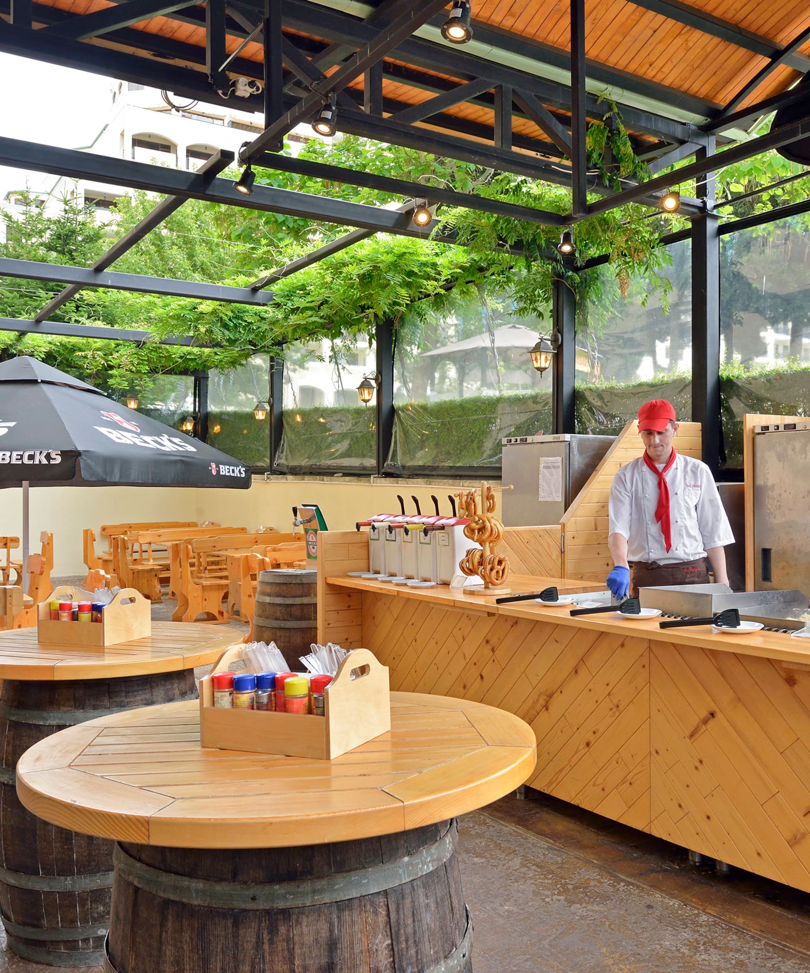 a group of men in white uniforms at a restaurant