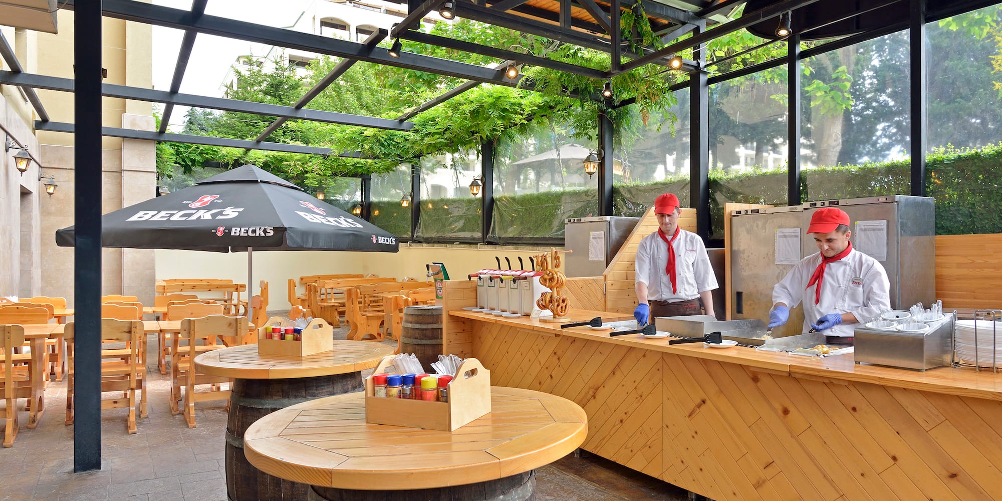 a group of men in white uniforms at a restaurant
