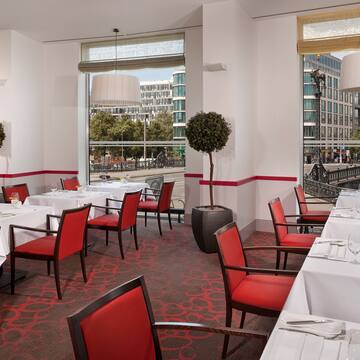 a room with tables and chairs